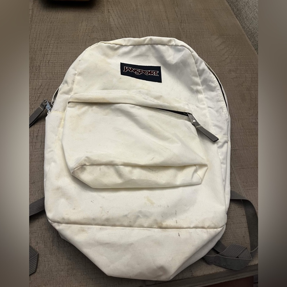 Jansport White Canvas Backpack with Front Zip Pocket